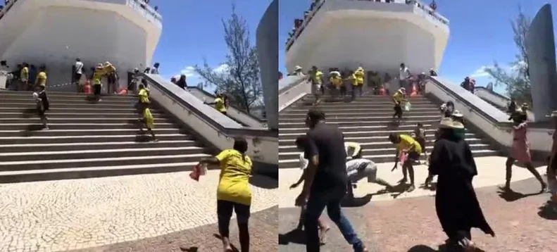 VÍDEO: Devoto joga dinheiro do alto de estátua de Padre Cícero e provoca correria em Juazeiro do Norte